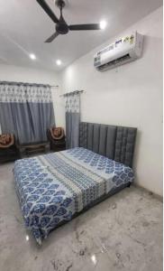 Postel nebo postele na pokoji v ubytování Beautiful condo with AC