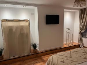 Ένα ή περισσότερα κρεβάτια σε δωμάτιο στο Havre de paix, centre ville de Châlons en Champagne