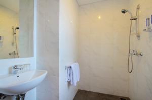 Koupelna v ubytování Vansari Hotel