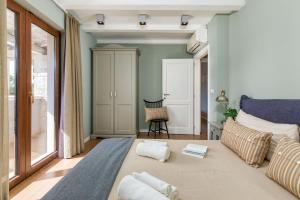 Postel nebo postele na pokoji v ubytování Villa Vira + 37 fotografií