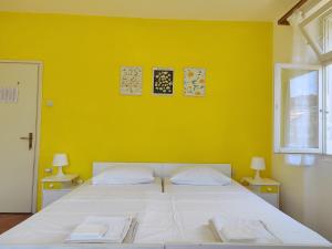 Postel nebo postele na pokoji v ubytování Guesthouse Franko