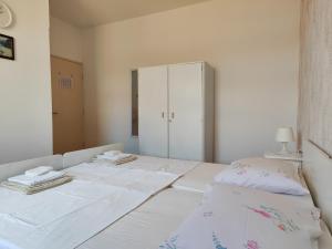 Postel nebo postele na pokoji v ubytování Guesthouse Franko