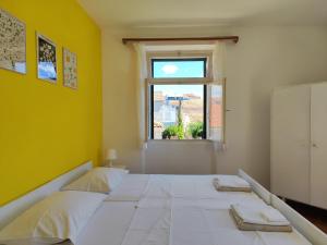 Postel nebo postele na pokoji v ubytování Guesthouse Franko