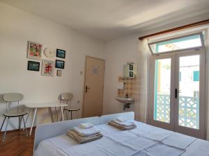Postel nebo postele na pokoji v ubytování Guesthouse Franko