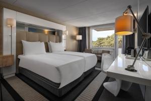 Voodi või voodid majutusasutuse WestCord Hotel Schylge toas