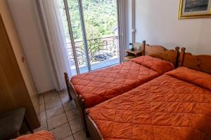 Letto o letti in una camera di Albergo Stazione