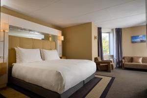 Voodi või voodid majutusasutuse WestCord Hotel Schylge toas