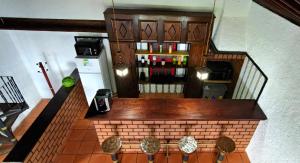 an overhead view of a bar in a house at Quinta dos Cinco Sentidos in Feteira Grande
