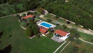 an aerial view of a house with a swimming pool at Holiday Home Campo in Rovinj
