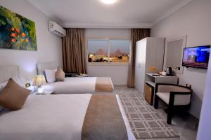 Letto o letti in una camera di Topview Pyramids And Museum