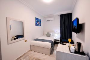 Letto o letti in una camera di Topview Pyramids And Museum