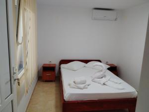 Postel nebo postele na pokoji v ubytování Casa A&V + 3 fotografie