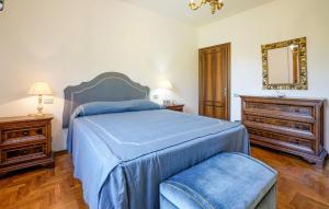 Katil atau katil-katil dalam bilik di Amazing Apartment In Monteriggioni