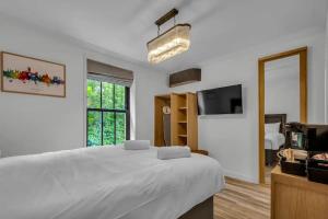 Downs View a Tranquil Space for Two Pass The Keys tesisinde bir odada yatak veya yataklar