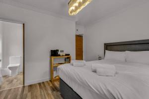 Downs View a Tranquil Space for Two Pass The Keys tesisinde bir odada yatak veya yataklar