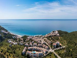 an aerial view of a resort next to the ocean at NAU Salema Beach Village in Salema