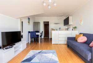 Televisor o centre d'entreteniment de Puck Marine Apartment by BookingHost