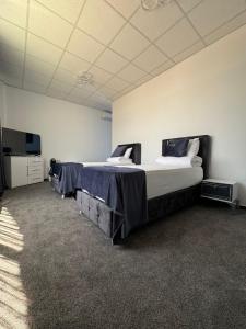 Postel nebo postele na pokoji v ubytování Hotel Daly + 37 fotografií