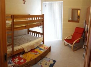 Postel nebo postele na pokoji v ubytování Gozo Ghajnsielem Apartment with large pool