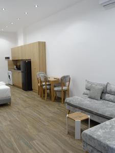Kuchyň nebo kuchyňský kout v ubytování DEJA BLUE Cozy Apartments