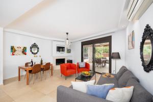 a living room with a couch and a table at Villa Ira in Lachania