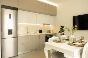 Η κουζίνα ή μικρή κουζίνα στο Sea view Uno apartment 2