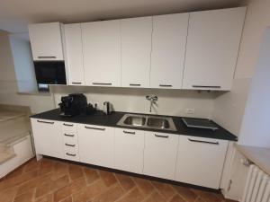 Η κουζίνα ή μικρή κουζίνα στο B&B Carazzole +2 φωτογραφίες