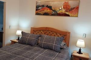 Ένα ή περισσότερα κρεβάτια σε δωμάτιο στο Linda casa Familiar +20 φωτογραφίες