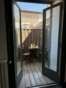 Μπαλκόνι ή βεράντα στο cite 4 Maison Bacou +15 φωτογραφίες