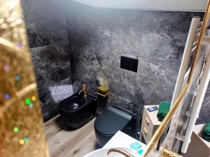 TV a/nebo společenská místnost v ubytování Gr Luxury