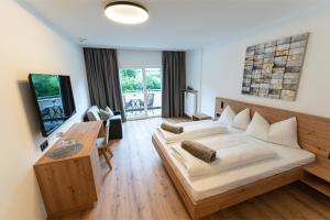 TV a/nebo společenská místnost v ubytování Self Service Hotel Schnalser Hof