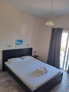 Postel nebo postele na pokoji v ubytování Golden Beach Sea View