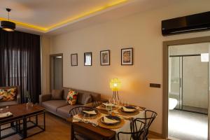 Posezení v ubytování First Class by Antalya Suites