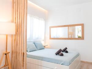 Cama o camas de una habitación en Estudio Jacuzzi con Encanto en Triana