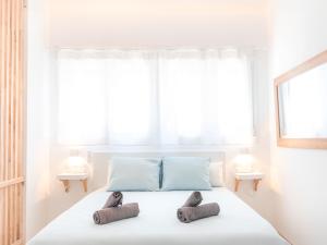 Cama o camas de una habitación en Estudio Jacuzzi con Encanto en Triana