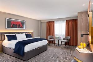 Postel nebo postele na pokoji v ubytování Talbot Hotel Clonmel