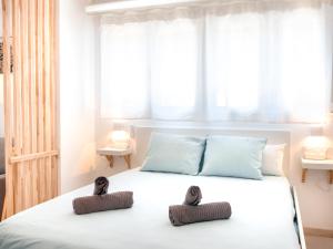 Cama o camas de una habitación en Estudio Jacuzzi con Encanto en Triana