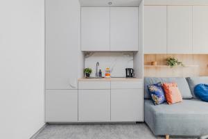 Kuchyňa alebo kuchynka v ubytovaní SuperApart Wilanów MiniStudio, Medicover, Świątynia Opatrzności
