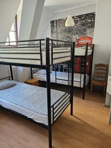 Posteľ alebo postele v izbe v ubytovaní Hostel Universus