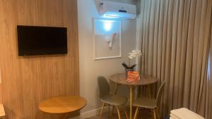 TV a/nebo společenská místnost v ubytování Prive Thermas Hotel by WAM Experience