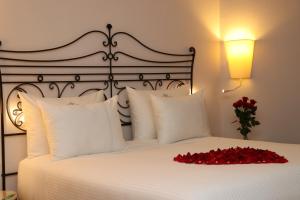 Кровать или кровати в номере The Residence Tunis