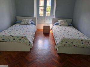 Łóżko lub łóżka w pokoju w obiekcie Casa BellaTerra
