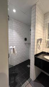 Koupelna v ubytování FORTUNE ATRIUM HOTEL