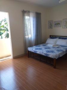 Postel nebo postele na pokoji v ubytování ESTILO APARTMENT 2-storey