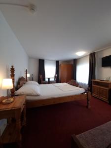 Postel nebo postele na pokoji v ubytování Spalenbrunnen Hotel & Restaurant Basel City Center