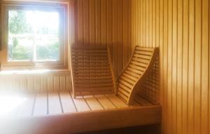 two chairs sitting in a room with a window at Awesome Home In Hemsedal With Sauna in Hemsedal