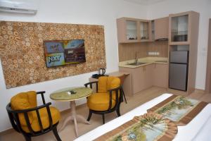 A kitchen or kitchenette at The Hague Maitama