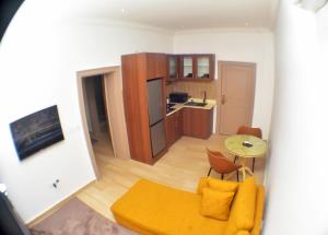 A kitchen or kitchenette at The Hague Maitama