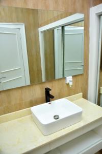 A bathroom at The Hague Maitama