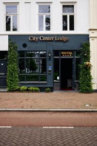 a city center lodge entrance to a hotel at City Center Lodge Utrecht in Utrecht